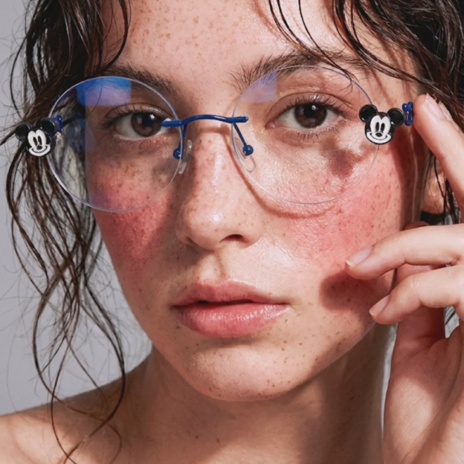 A stylish woman showcasing her everyday look featuring Rimless Round Glasses in Metal for daily wear.