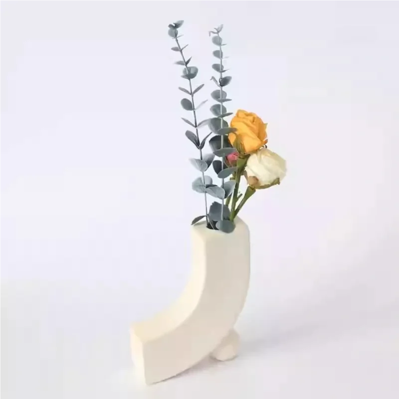 A minimalist matte white curved backdrop setup featuring White Photography Backdrop in PVC for product photography and still life studio scenes.